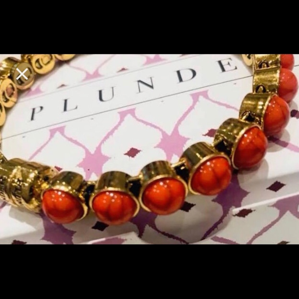 Plunder orange magnetic bangle